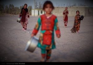 پخت و توزیع غذای نذری در مناطق محروم کرمان